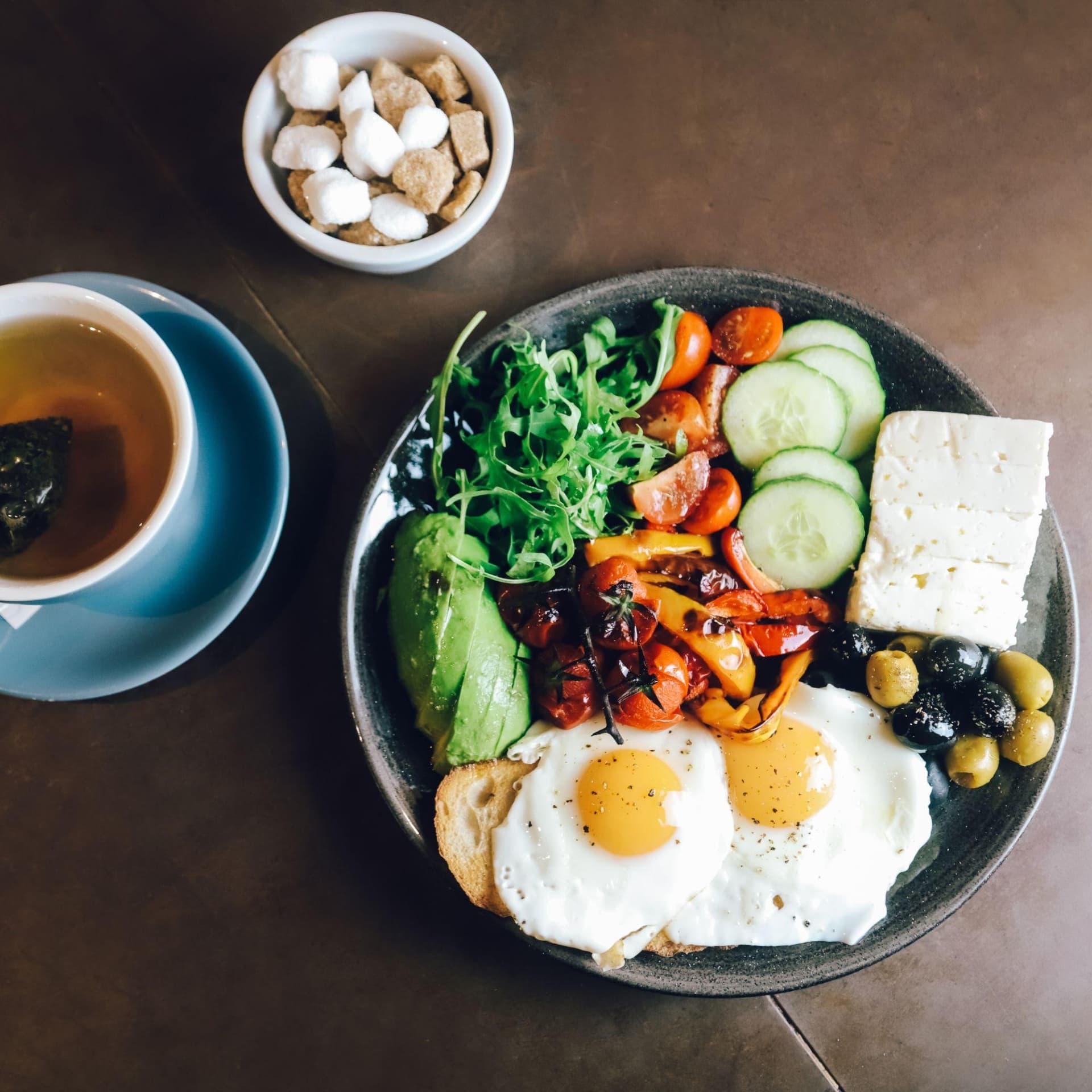 Mediterranean diet foods including olive oil, vegetables, fish and whole grains