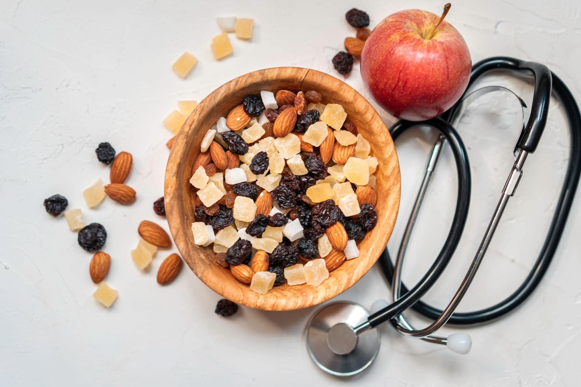 Heart healthy foods including fresh produce and olive oil