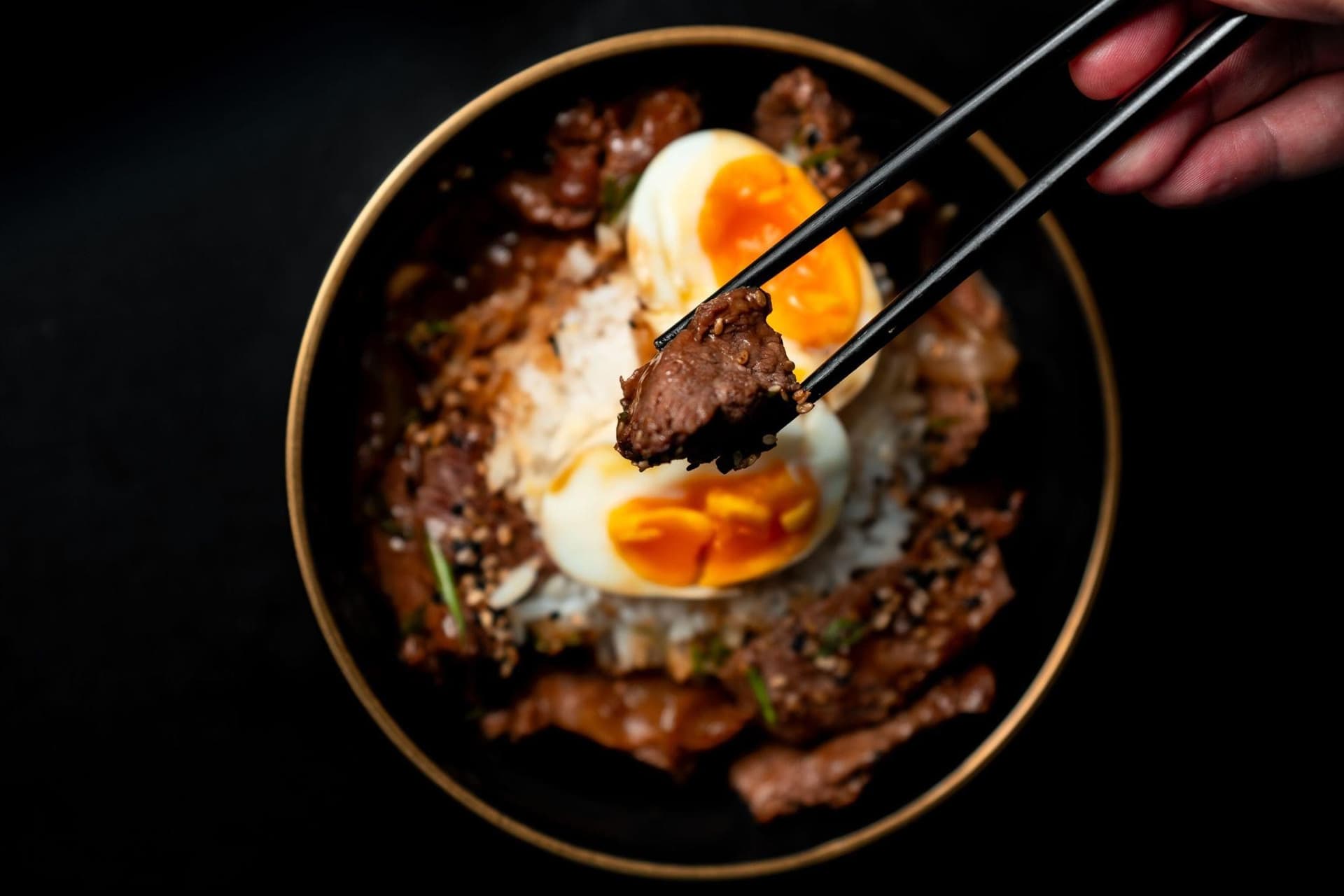 Healthy Korean Beef Bowl served over rice with vegetables