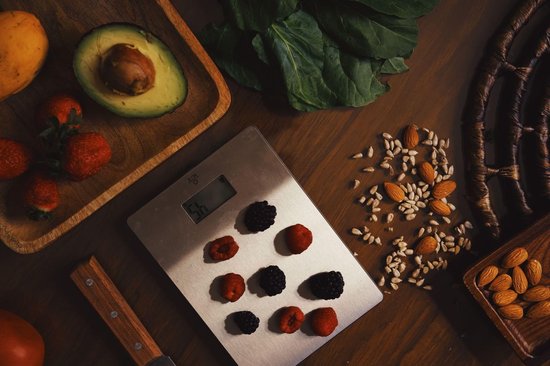 A person weighing food and tracking nutrition macros